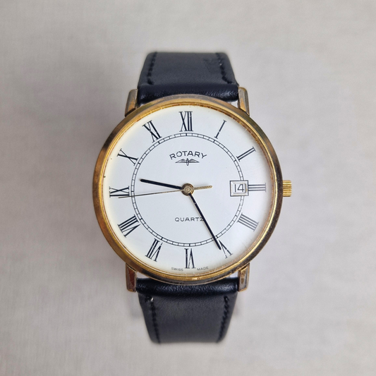 Vintage Rotary Watch Ref. 3703 371 with gold-plated case, white Roman numeral dial, and black leather strap.