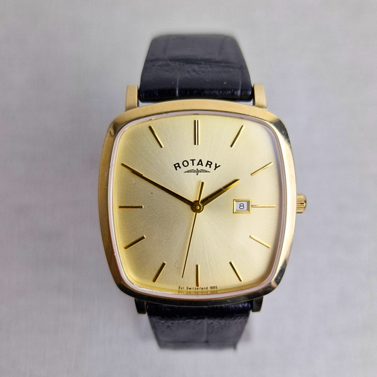 Elegant vintage Rotary Windsor men’s watch with 35mm gold-plated tank-style case, champagne dial, and quartz movement. Serviced and in excellent working condition.